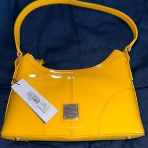 NWT Dooney Baguette Sm. Shoulder Bag **Has flaws.